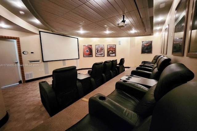 carpeted cinema with wood ceiling