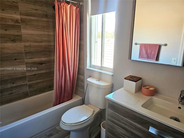 bathroom with toilet, shower / bath combo, and vanity