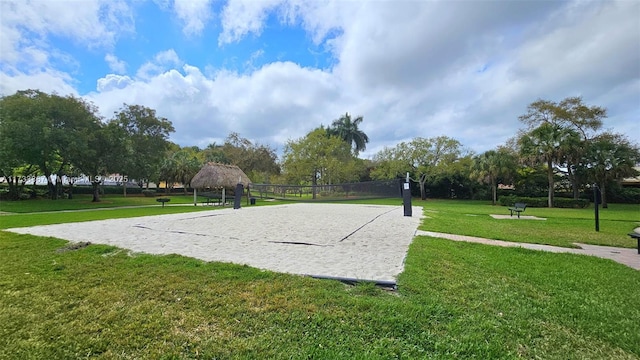 view of home's community with volleyball court, a yard, and a gazebo