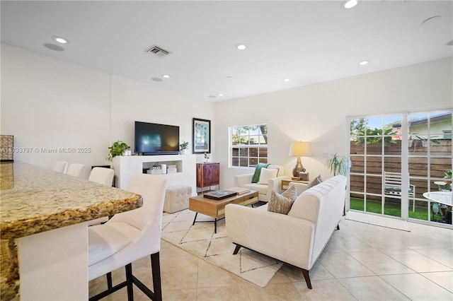 living room with light tile patterned floors