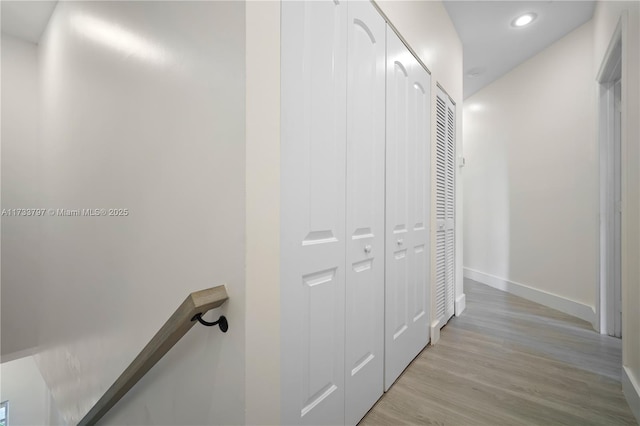 hallway featuring light hardwood / wood-style flooring