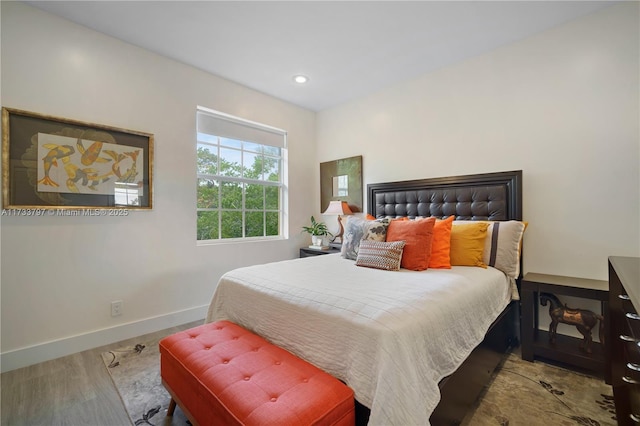 bedroom featuring hardwood / wood-style floors