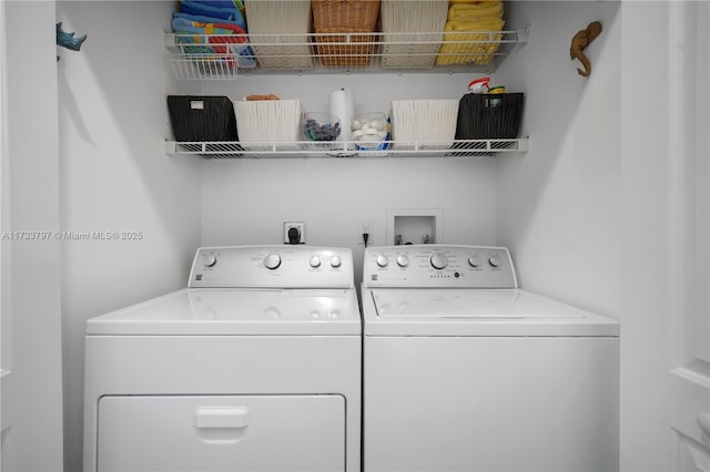 laundry area featuring washer and clothes dryer