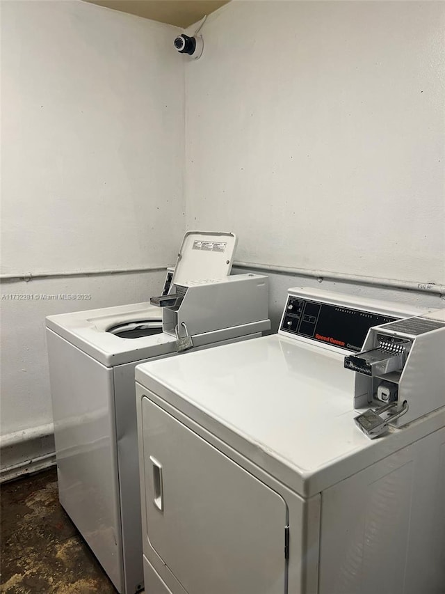 laundry area featuring washing machine and dryer