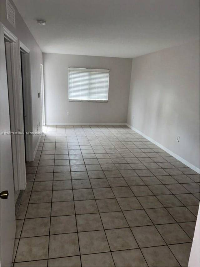 view of tiled spare room