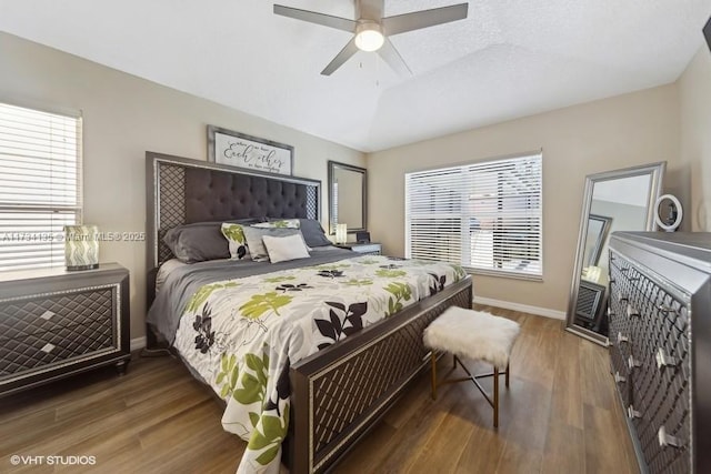 bedroom featuring dark wood-type flooring and ceiling fan