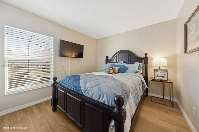 bedroom featuring light hardwood / wood-style flooring