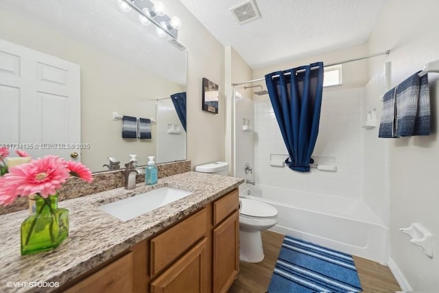 full bathroom with toilet, wood-type flooring, shower / bathtub combination with curtain, and vanity