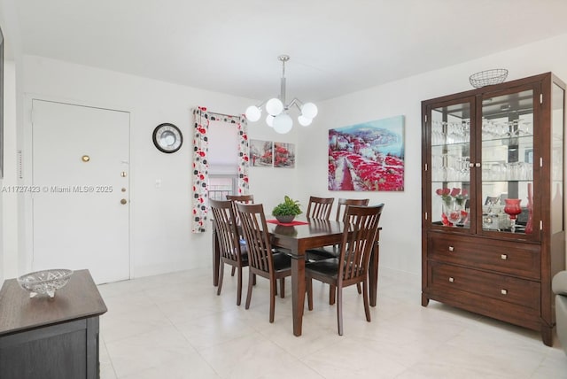 dining space with a chandelier