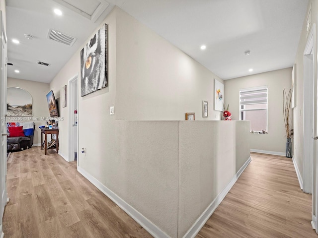 hallway featuring light hardwood / wood-style flooring