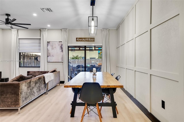 dining room featuring ceiling fan and light hardwood / wood-style floors