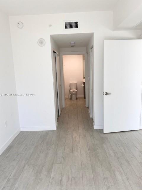 hall featuring light hardwood / wood-style flooring