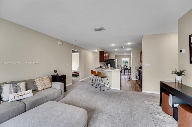 living room featuring carpet