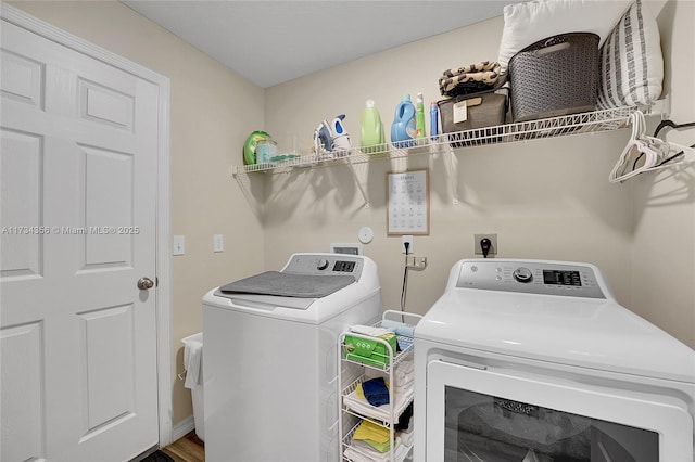 laundry room featuring independent washer and dryer