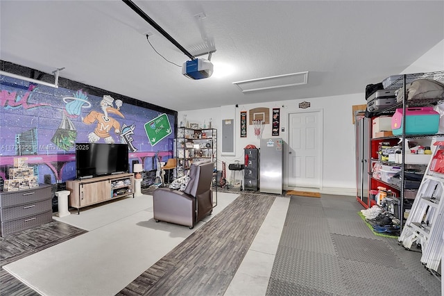 garage featuring a garage door opener and electric panel