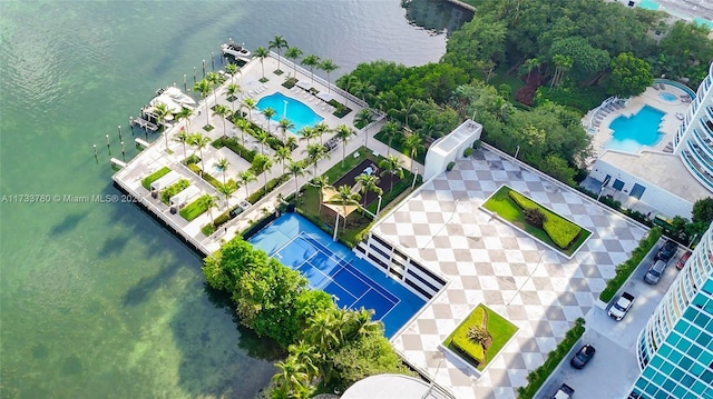 birds eye view of property featuring a water view