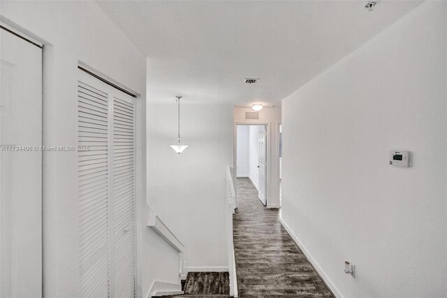 bathroom featuring vanity, toilet, a textured ceiling, and walk in shower