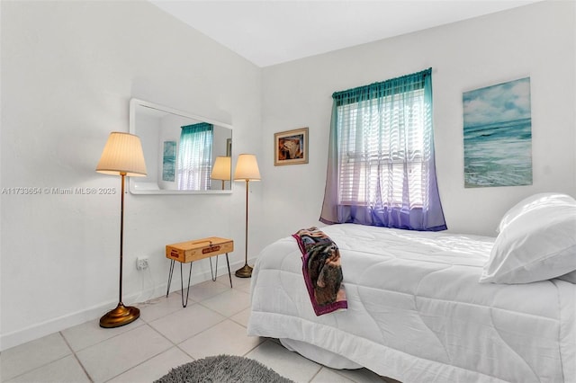 bedroom featuring tile patterned floors