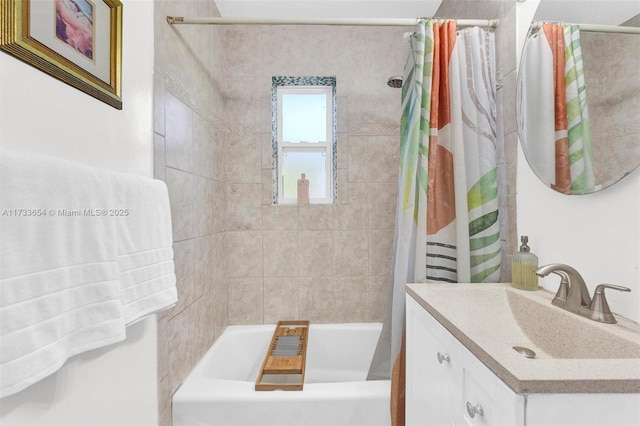 bathroom with vanity and shower / tub combo with curtain