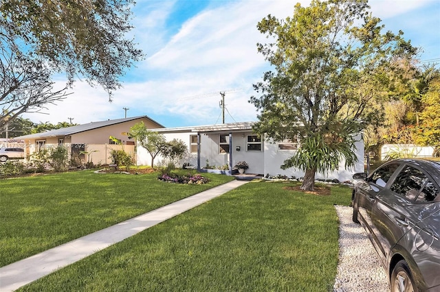 view of front of house with a front lawn