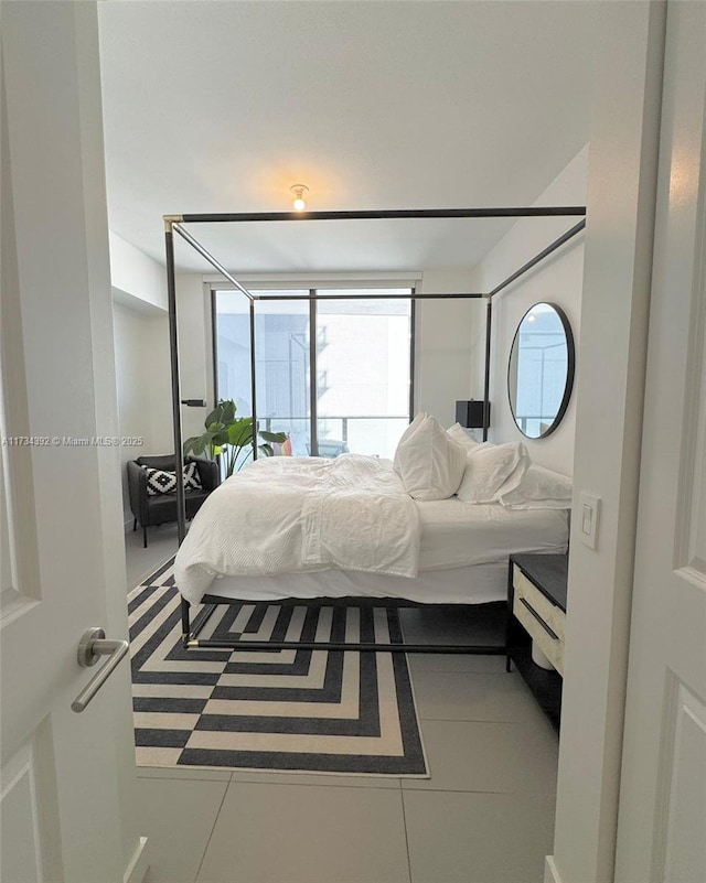 bedroom featuring tile patterned flooring