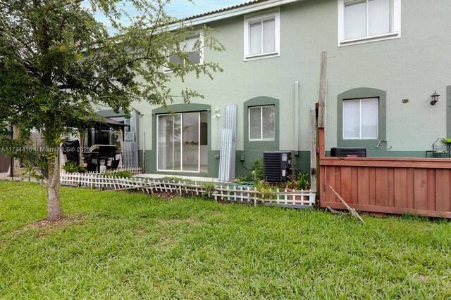 2818 SE 16th Ave Unit 118, Homestead, FL 33035 - back of house featuring stucco siding