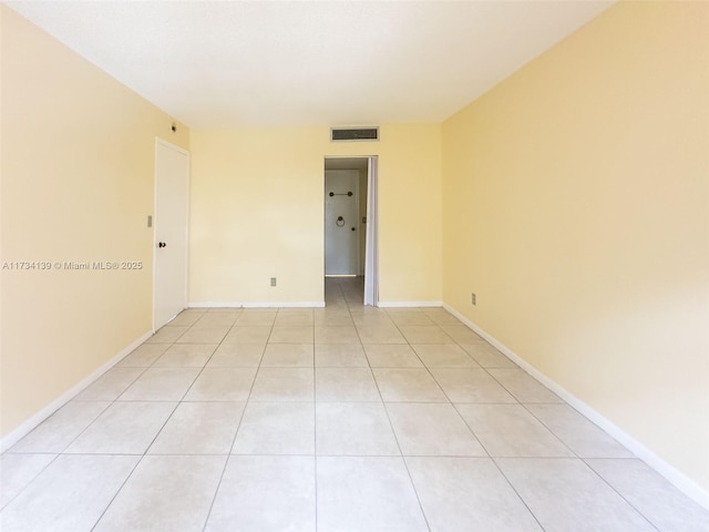 view of tiled spare room