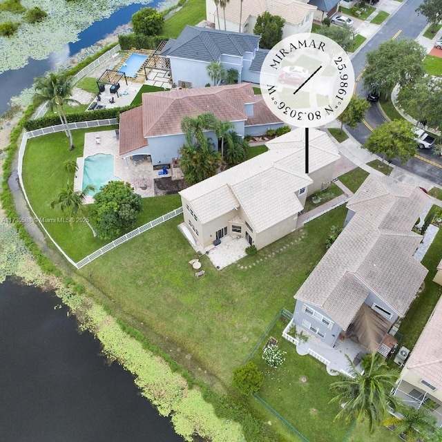 birds eye view of property featuring a water view