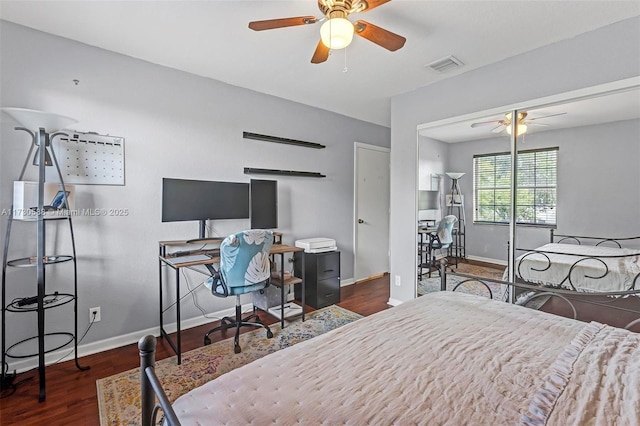 bedroom with dark wood-type flooring and ceiling fan