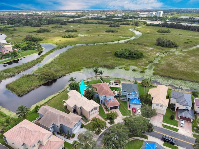 drone / aerial view with a water view