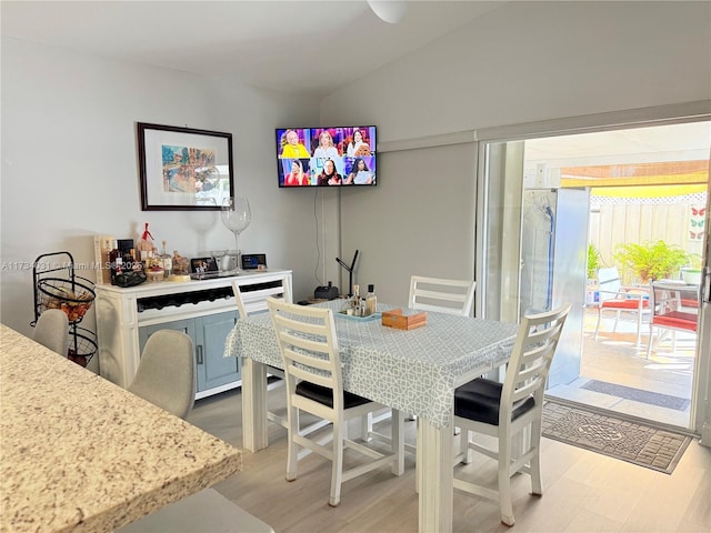 dining room with light hardwood / wood-style flooring