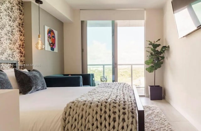 bedroom featuring expansive windows