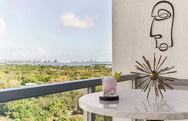 balcony featuring a water view