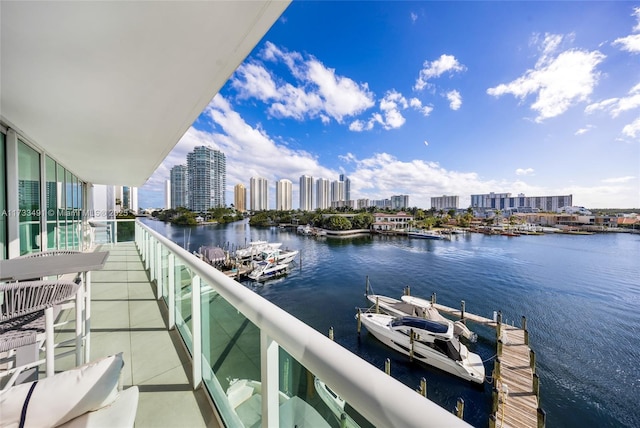 balcony featuring a water view