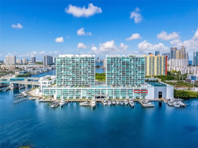 birds eye view of property featuring a water view