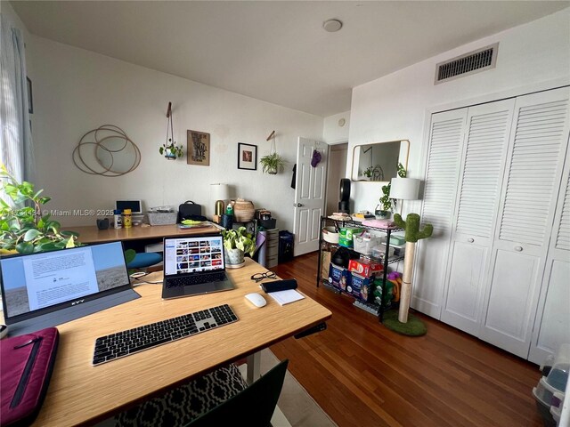 home office featuring dark hardwood / wood-style flooring