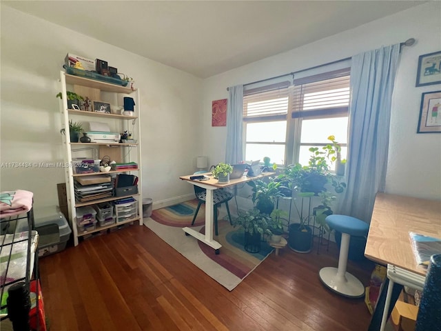 office with dark wood-type flooring