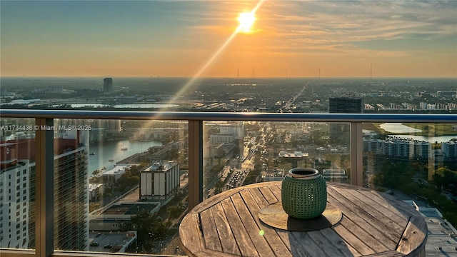 view of balcony at dusk