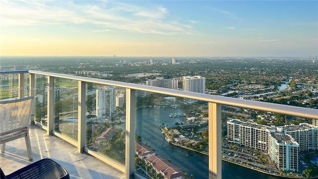 balcony at dusk with a water view