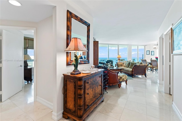6365 Collins Ave Unit 1901, Miami Beach, FL 33141 - corridor with light tile patterned flooring and baseboards