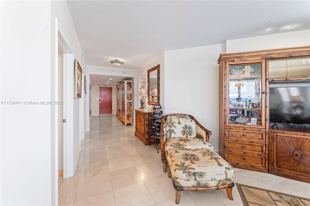 hallway featuring light tile patterned flooring