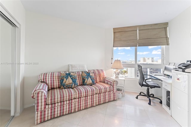 office area with light tile patterned flooring