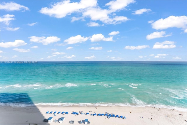 view of water feature with a beach view