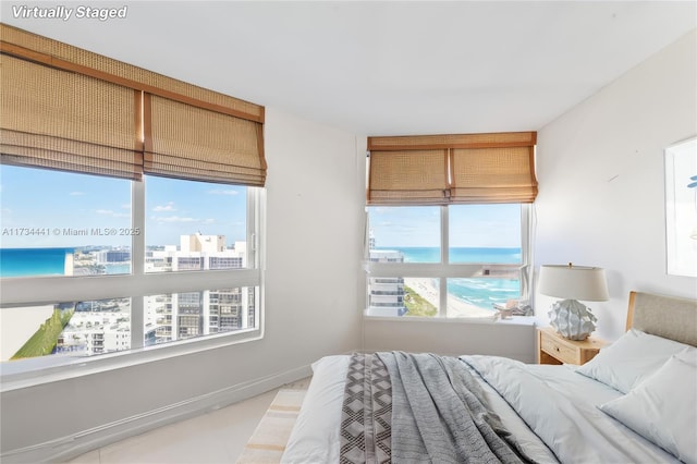 bedroom with a water view