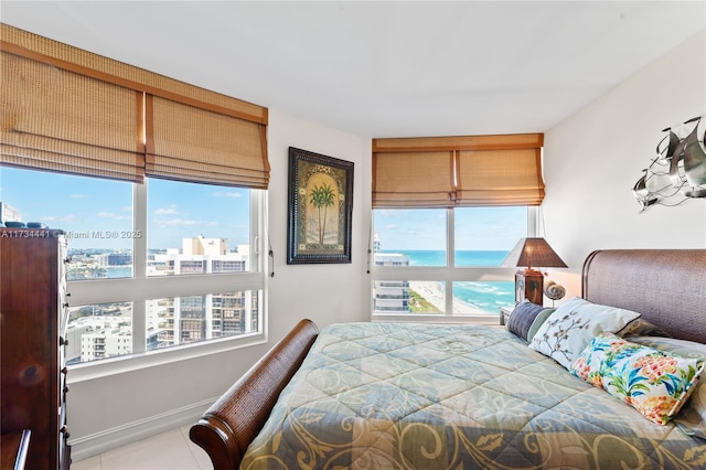 6365 Collins Ave Unit 1901, Miami Beach, FL 33141 - bedroom with tile patterned flooring and baseboards