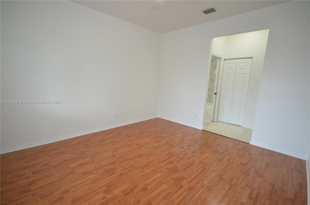 empty room featuring light wood-type flooring