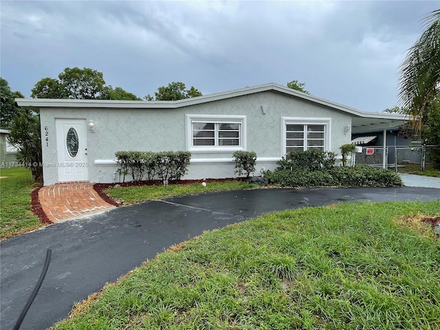 view of front of house with a carport