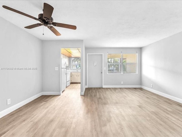 unfurnished living room featuring light wood-type flooring