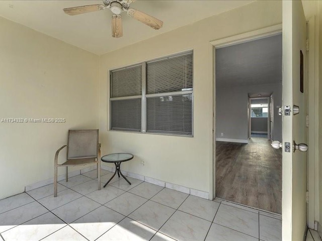 view of patio featuring ceiling fan