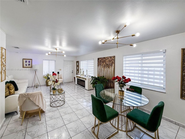 dining room with a chandelier